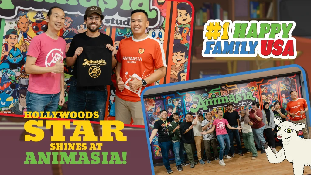 Three people standing side by side at Animasia Studio — from left to right, an Animasia representative in a pink shirt, a special Hollywood guest holding an Animasia 20th Anniversary tote bag, and another Animasia team member in an orange jersey. They are smiling in front of a vibrant wall filled with Malaysian animated characters, with the text “Hollywood’s Star Shines at Animasia!” and “#1 Happy Family USA.”